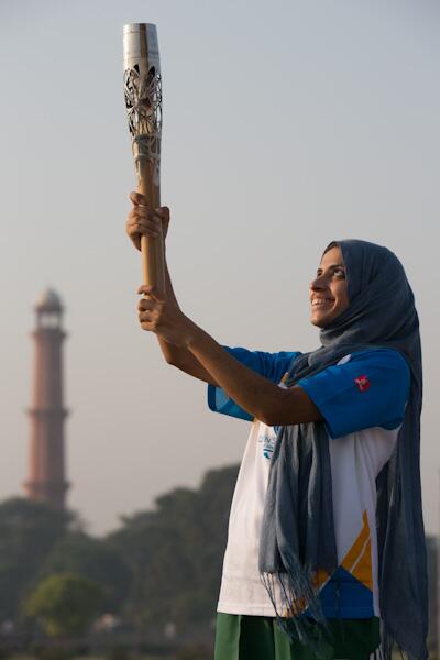 Pakistan's karate player Benish Akbar took part in the Queen's Baton Relay as it visited Lahore