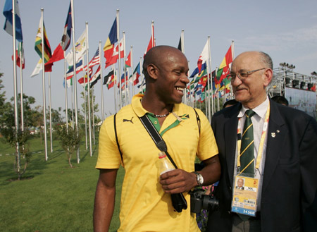 Mike Fennell_with_Asafa_Powell