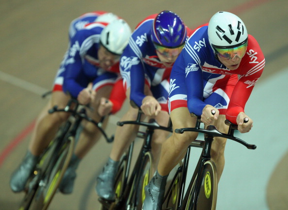 Steven Burke_of_Team_GB_leads_team_mates_leads_Andrew_Tennant_Jason_Queally_and_Ed_Clancy_17-10-11