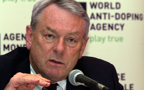 Dick Pound_in_front_of_WADA_logo
