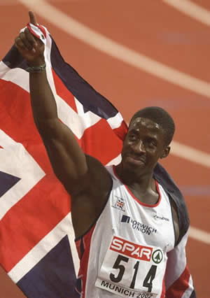 Dwain Chambers_with_GB_flag