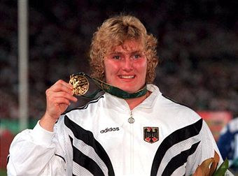 Ilke Wyludda_with_gold_medal_Atlanta_1996