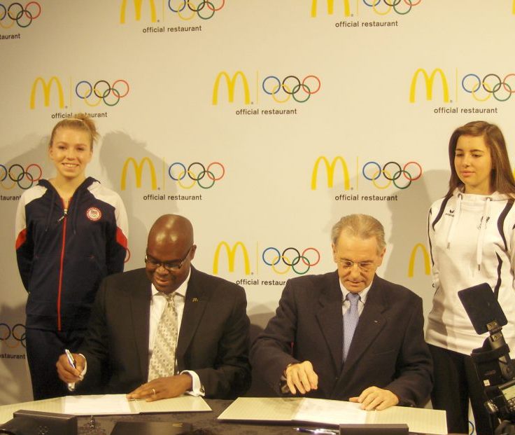 McDonalds Don_Thompson_and_IOC_Jacques_Rogge_sign_sponsorship_deal_Innsbruck_January_13_2012
