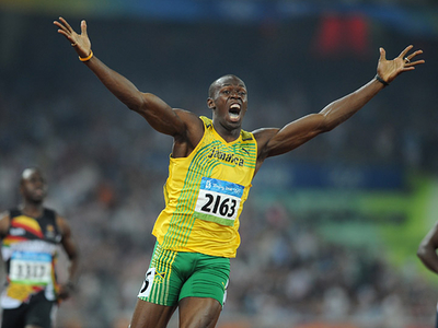 Usain Bolt_celebrating_after_crossing_the_line_Beijing_2008