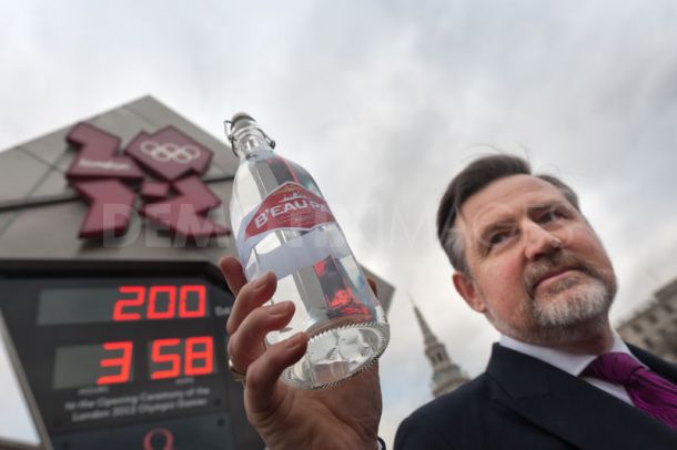 Barry Gardiner_with_Bhopal_water_at_London_2012_countdown_clock