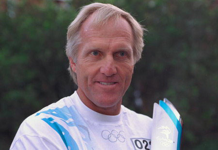 Greg Norman_with_Olympic_torch