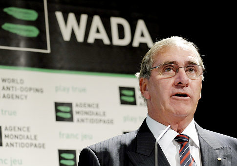 John Fahey_in_front_of_WADA_logo_Lausanne