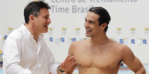 Sebastian Coe_talking_to_swimmer_in_Rio_March_20_2012