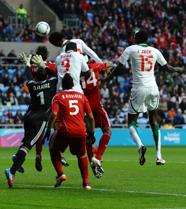 Ibrahima Balde_scores_Senegals_first_goal_in_London_2012_playoff_April_23_2012