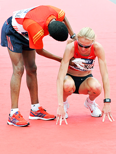 Paula Radcliffe_on_hands_and_knees_end_of_Vienna_half_marathon_April_15_2012
