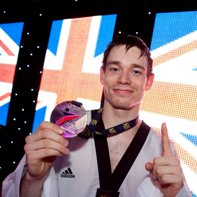 Aaron Cook_with_European_Championships_medal_May_6_2012