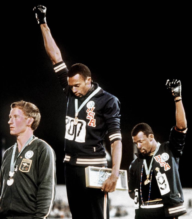 Tommie Smith_center_and_John_Carlos_right__21-05-12