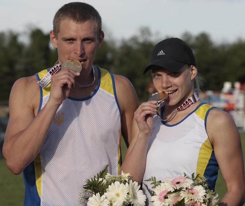 Ukraine celebrate_winning_mixed_relay_World_Championships_Rome_May_9_2012