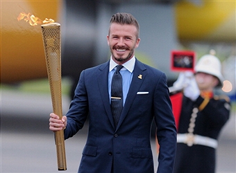 David Beckham_and_Olympic_Flame_June_23