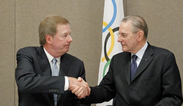 Larry Probst_seals_revenue_sharing_deal_with_Jacques_Rogge_Quebec_City_May_2012