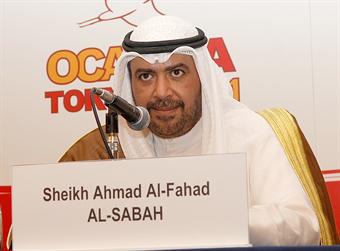 Sheikh Ahmad_Al-Fahad_Al-Sabah_behind_name_badge_and_microphone