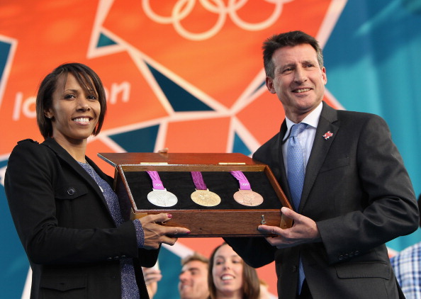 Dame Kelly_Holmes_and_Sebastian_Coe_hold_medals_at_1_year_to_go_to_London_2012