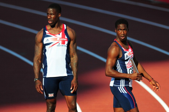 Dwain Chambers__Christian_Malcolm_of_Great_Britain_react_after_dropping_the_baton_in_the_Mens_4x100_Metres_Final_at_the_European_Athletics_Championships_Helsinki_2012