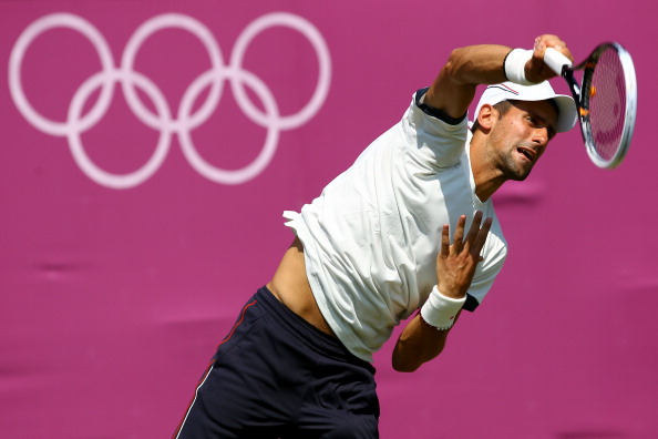 Novak Djokovic_of_Serbia_serves_during_the_practice_session_ahead_of_the_2012_London_26-07-12