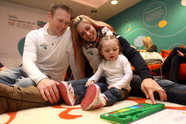 Slider Noelle_Pikus-Pace_plays_with_her_husband_Janson_Pace_and_their_daughter_Jacee_at_the_PG_Family_Home_on_Februiary_14_2010_during_the_Olympic_Winter_Games_in_Vancouver_25-07-12