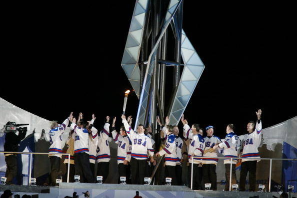 USA hockey_team_lighting_Olympic_flame_Salt_Lake_City_2002