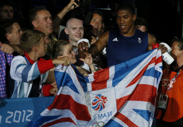 Anthony Joshua_of_Great_Britain_celebrates_his_gold_medal_with_fans