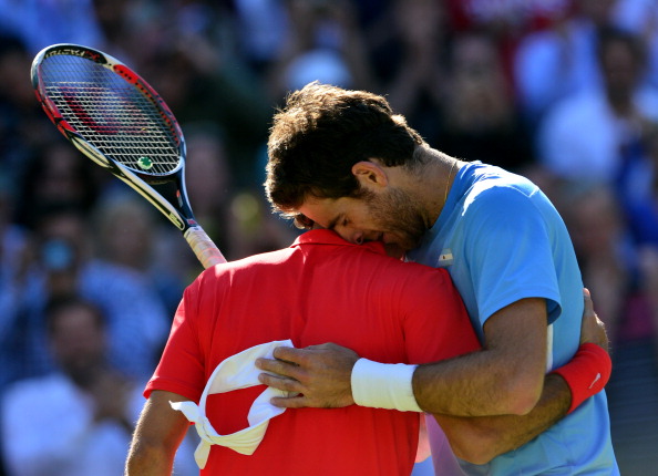 Juan Martin_del_Potro_reacts_with_Switzerlands_Roger_Federer