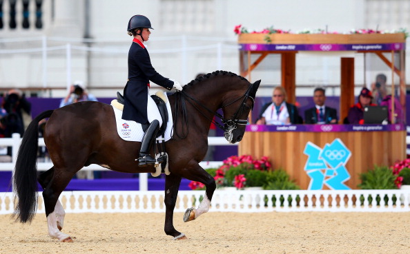 Judges watch_Charlotte_Dujardin_of_Great_Britain_riding_Valegro_as_she_competes_in_the_Team_Dressage_Grand_Prix_Special