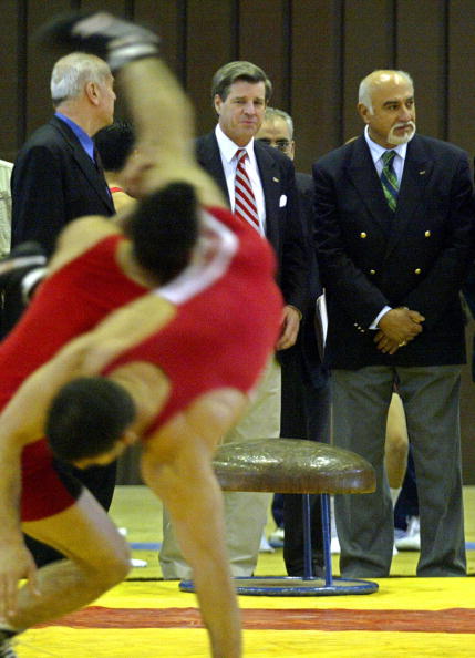 Paul Bremer_C_US_top_civil_administrator_in_Iraq_and_Ahmed_al-Samarrai_head_of_the_Iraqi_Olympic_Committee_watch_Iraqis_wrestlers_performing_at_Baghdads_indoor_Olympic_Hall_05_February_2004
