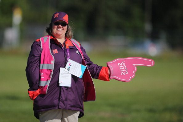 A London_2012_Games_Maker_directs_fans_to_the_equestrian_events_at_Greenwich_Park