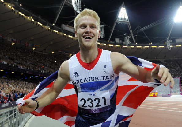 Britains Jonnie_Peacock_celebrates_winning_the_London_2012_mens_100m_T44_final