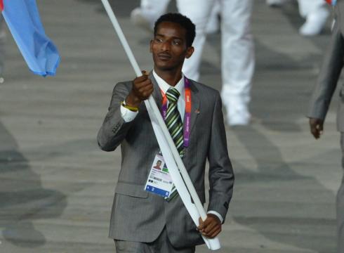 Eritrea flagbearer_Weynay_Ghebresilasie_leading_his_delegation_during_the_Opening_Ceremony_intends_to_seek_political_asylum_in_Britain