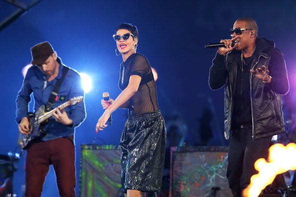 Jay-Z and_Rihanna_perform_with_Will_Champion_of_Coldplay_L_during_the_closing_ceremony