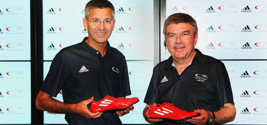 Thomas Bach_with_Herbert_Hainer_as_Adidas_renew_deal_with_DOSB