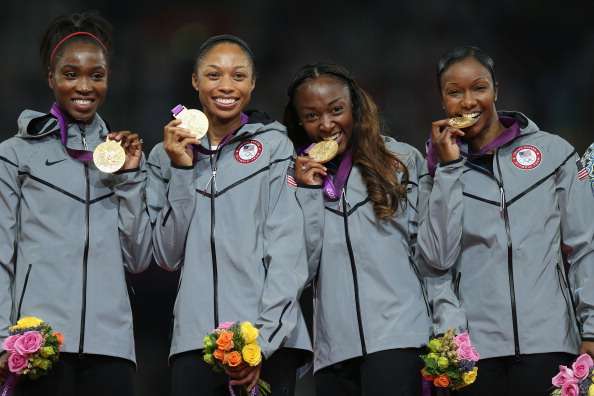 Tianna Madison_on_medal_podium_with_London_2012_gold