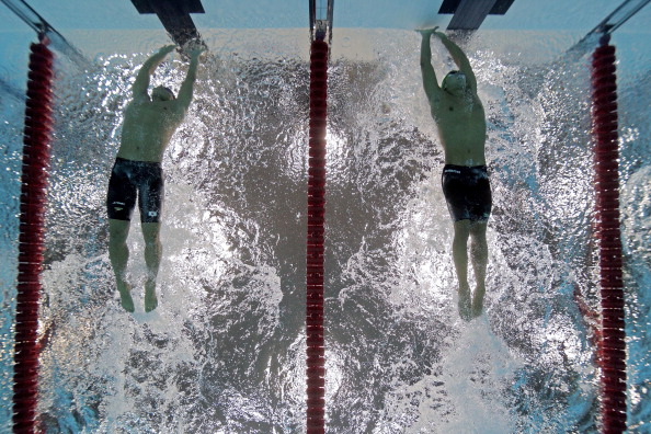 Chad le_Clos_R_of_South_Africa_touches_out_Takeshi_Matsuda_of_Japan_to_win_the_gold_medal_in_the_Mens_200m_Butterfly
