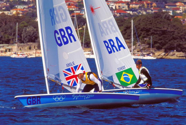 Ben Ainslie on his way to gold and Robert Scheidt sailing to silver in the mens open Laser fleet races at Sydney 2000