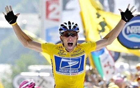 Lance Armstrong celebrating as he crosses the line