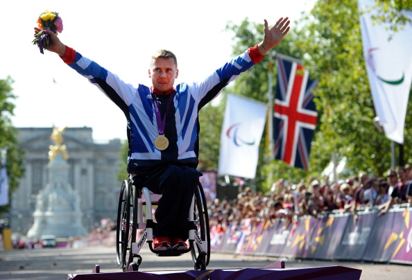 David Weir on medal podium after winning London 2012 marathon September 9 2012