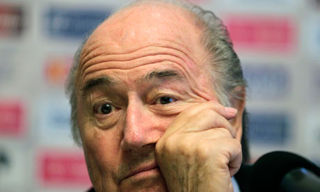 Sepp Blatter with hand on head