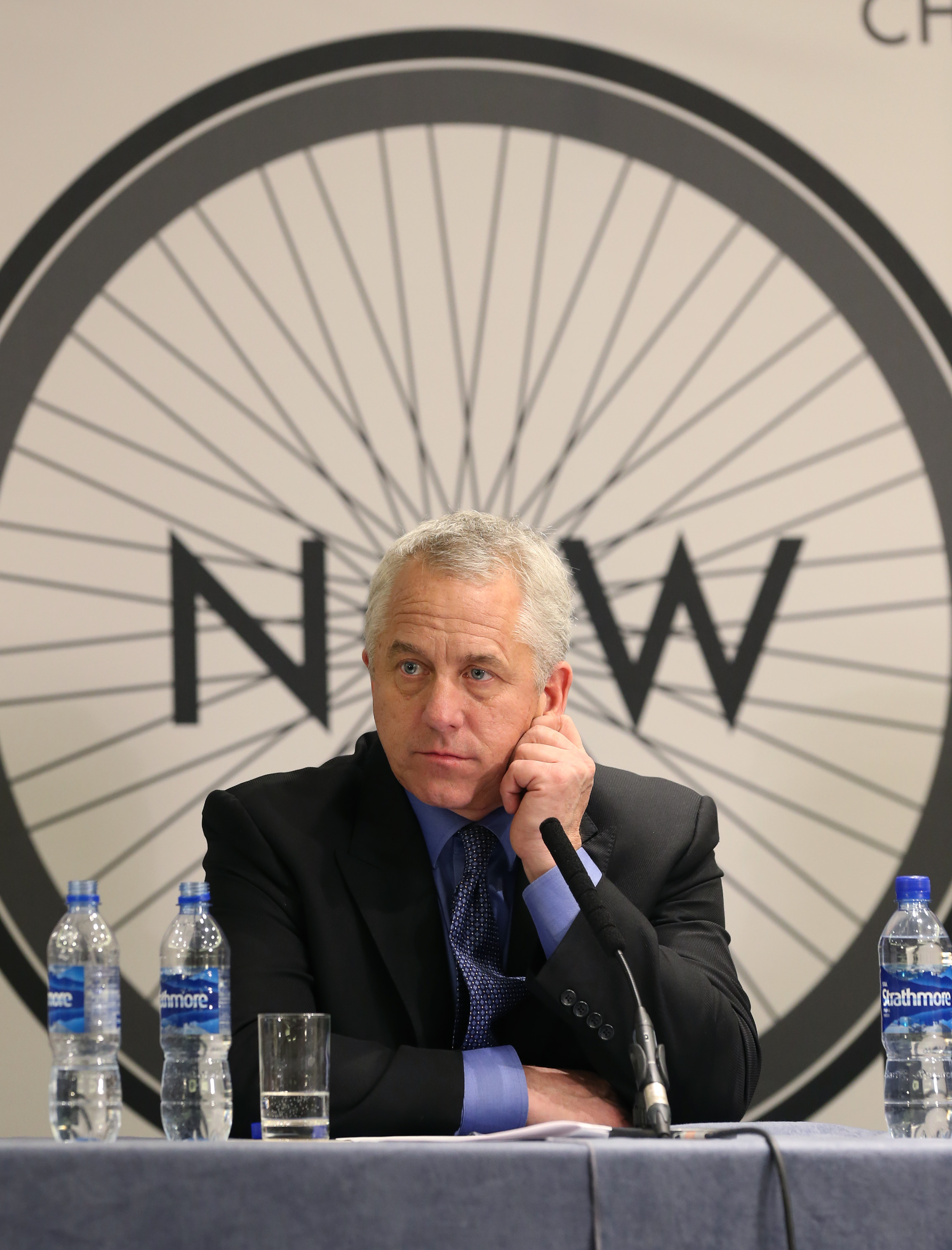 Greg LeMond in front of Change Cycling Now logo 2