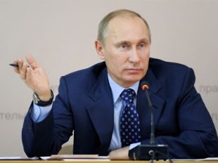 Vladimir Putin with pen