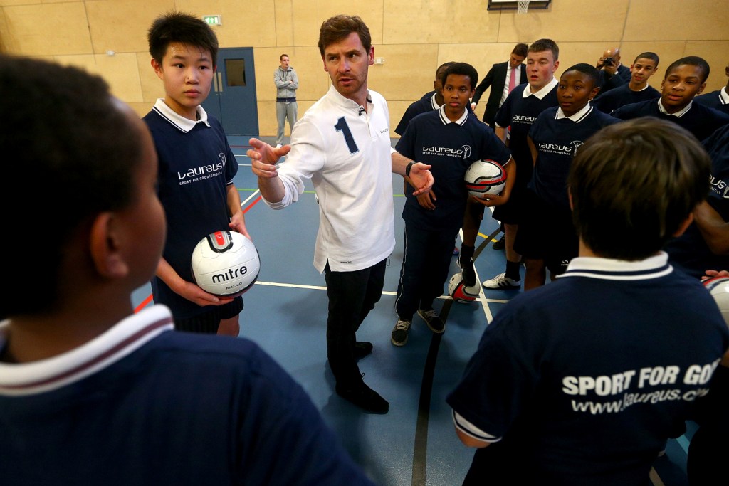Andre Villas Boas gives football coaching to local school children during the Laureus Urban Research report launch