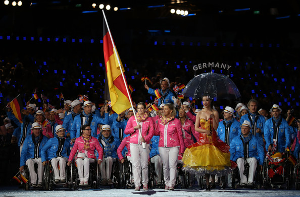 Danielle Schulte carrying flag at London 2012