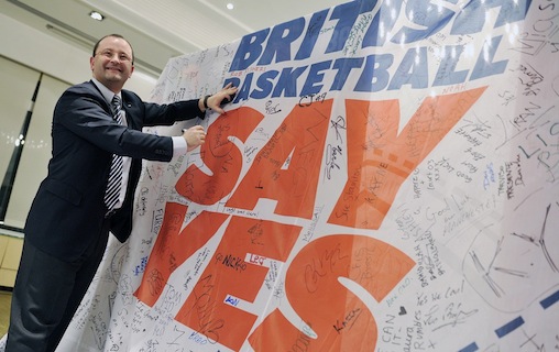 Patrick Baumann signing British Basketball banner