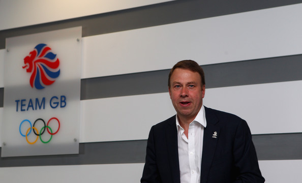 Andy Hunt in front of Team GB sign at London office