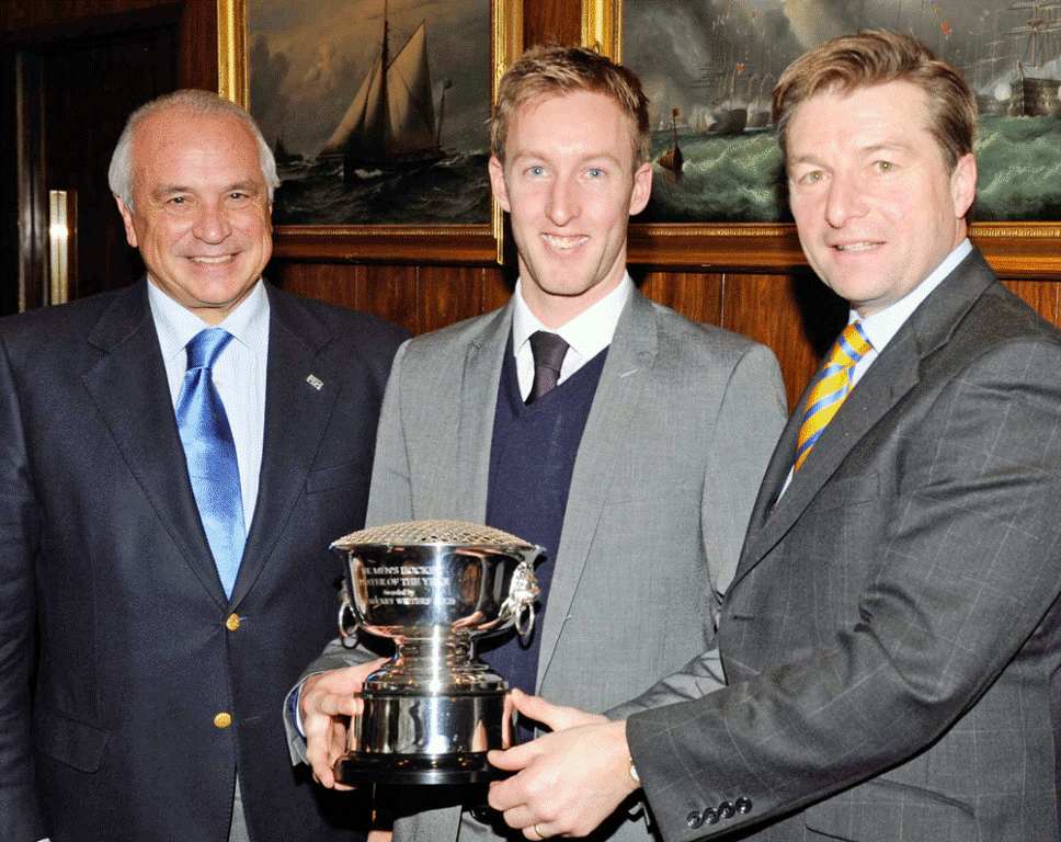 Barry Middleton receives his award from Leandro Negre L and Richard Leman