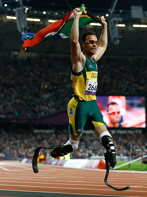 Oscar Pistorius with South African flag London 2012 Paralympics
