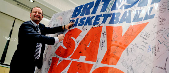 Patrick Baumann signs basketball petition