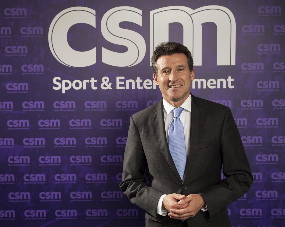 Sebastian Coe in front of CSM logo